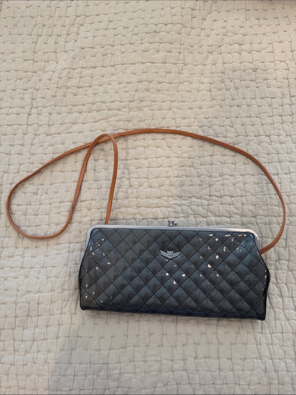 Consuela Quilted Black Crossbody Clutch with Tan Strap